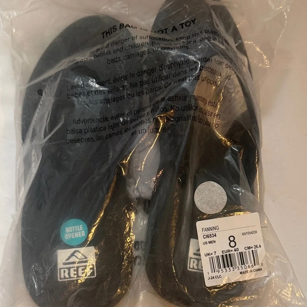 Reef Black and Silver Fanning Flip-Flop with Bottle Opener